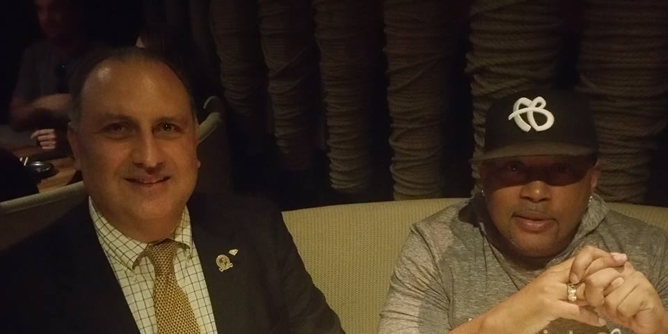 Daymond John smiling at a business event