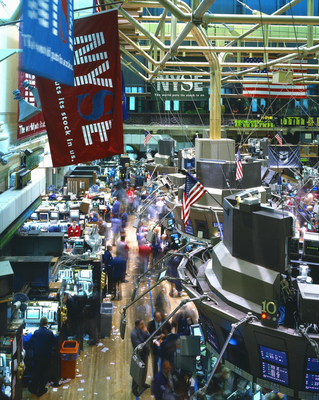 Traders and screens on the floor of the New York Stock Exchange