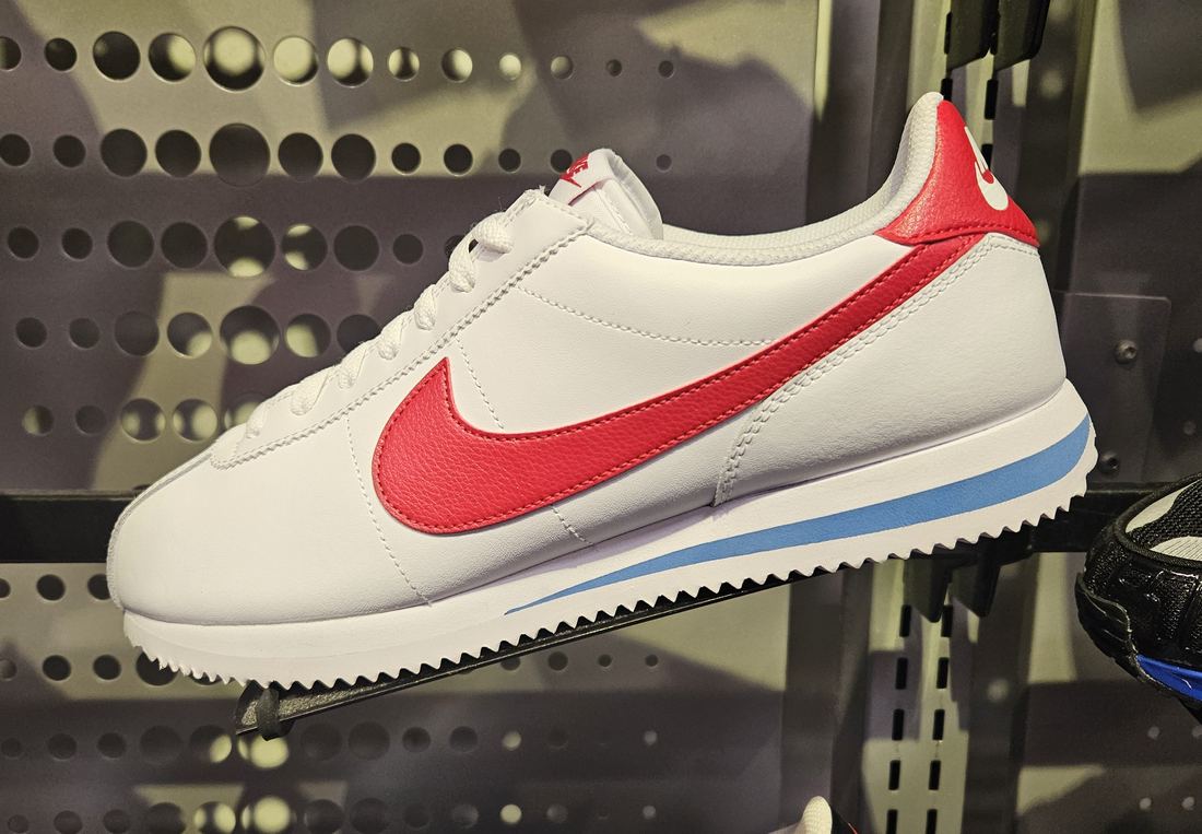 A classic Nike Cortez running shoe photographed on its own